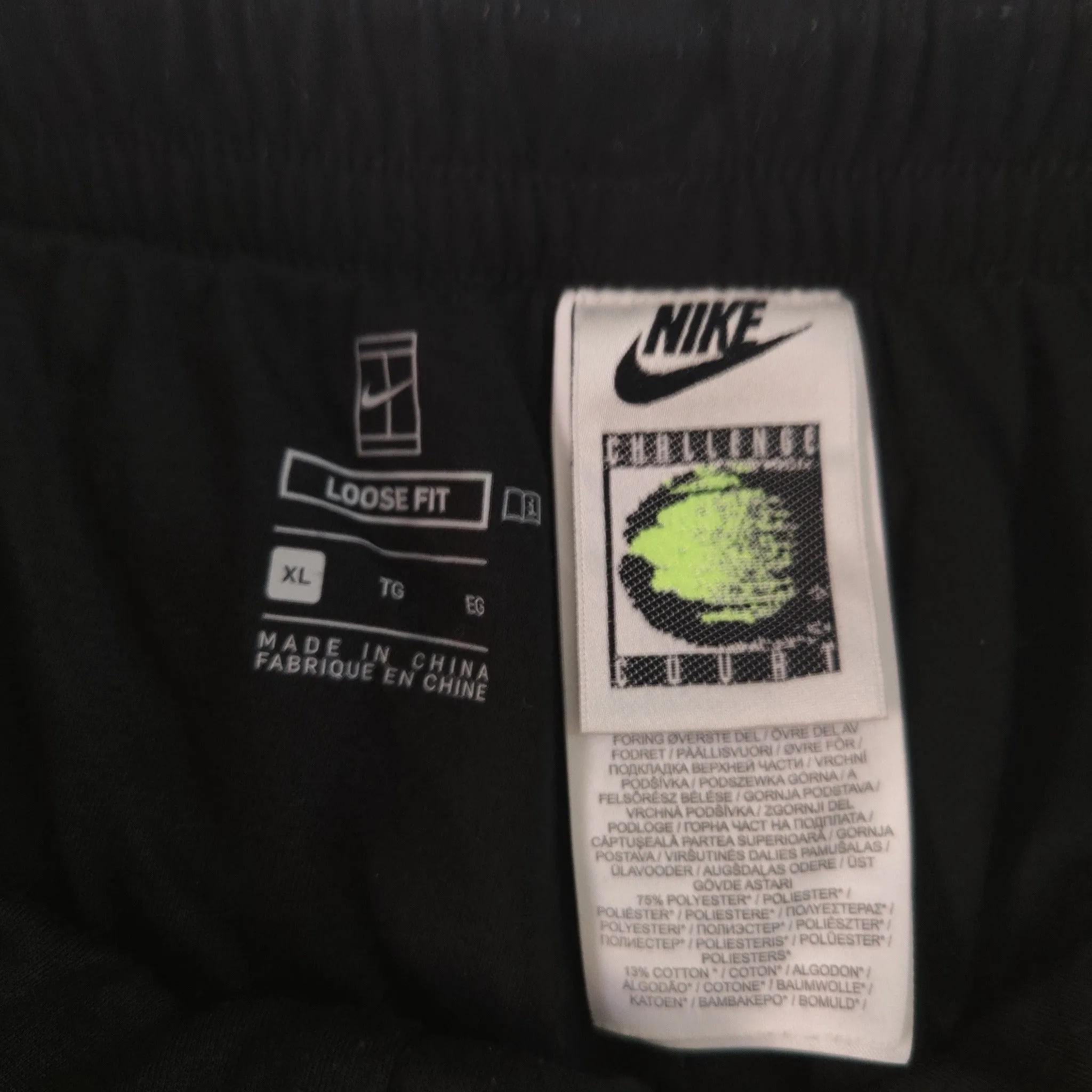 Black Nike Challenge Court trousers