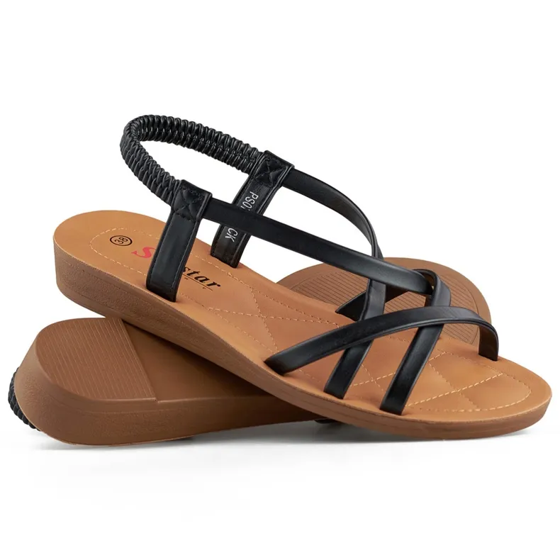 Black women's sandals with a flat sole