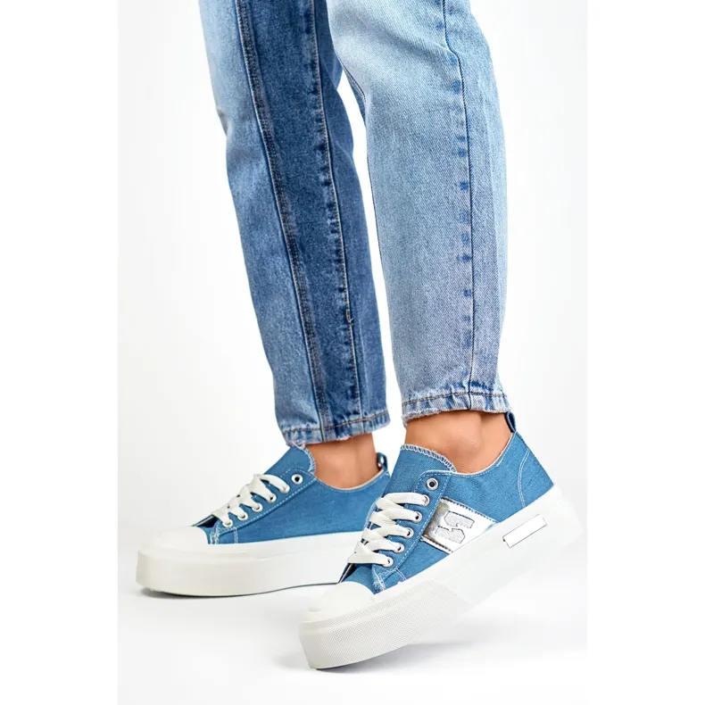 Fashionable women's denim sneakers with a thick platform sole blue